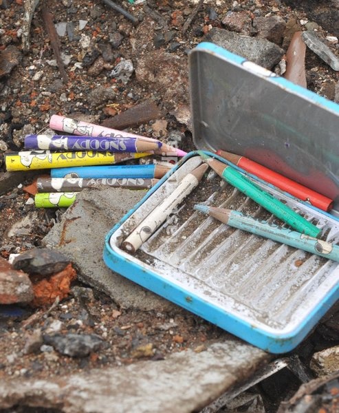 IWATE (JAPAN), March 22, 2011 () -- Color pencils are seen in quake-devastated Iwate Prefecture, Japan, on March 21, 2011. The tsunami disaster has actually inundated a large area behind the board. The National Police Agency said Tuesday that the catastrophic earthquake and ensuing tsunami have…