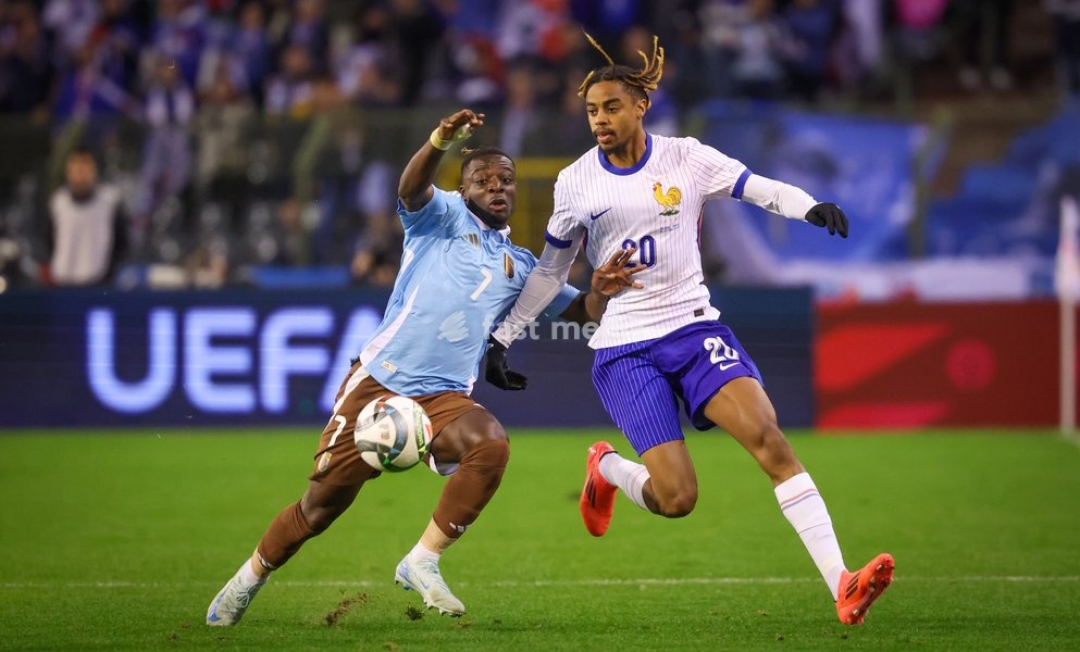 Belgium's Jeremy Doku and France's Bradley Barcola fight for the ball during a soccer game between Belgian national soccer team Red Devils and France, match 4 (out of 6) in the League A Group 2 of the UEFA Nations League 2025 competition, Monday 14 October 2024 in Brussels
