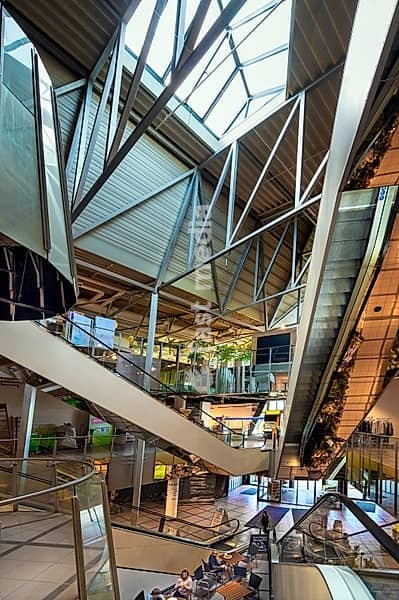 Shopping centre, the Fenepark, entrance area with escalators, Kempten, Allgäu, Bavaria, Germany, Europe