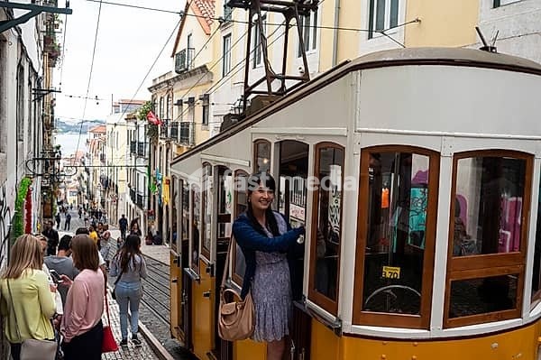10.06.2018, Lisbon, Portugal, Europe, Tourists on the Ascensor da Bica tram, also known as the Bica Funicular, in the historic centre of the Portuguese capital, Europe