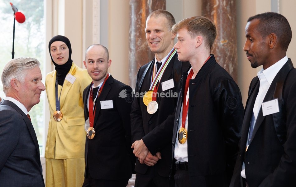 King Philippe - Filip of Belgium, Belgian taekwondoka Sarah Chaari, Belgian Paralympian athlete Tim Celen , Belgian Paralympian athlete Ewoud Vromant, Belgian Paralympian athlete Laurens Devos and Belgian athlete Bashir Abdi pictured during a royal meeting with the olympic athletes, in Brussels,…
