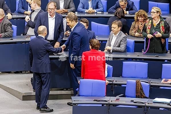 Olaf Scholz (SPD), Federal Chancellor, greets Lars Klingbeil in the plenary chamber in front of the session in the German Bundestag, Berlin, 13 November 2024