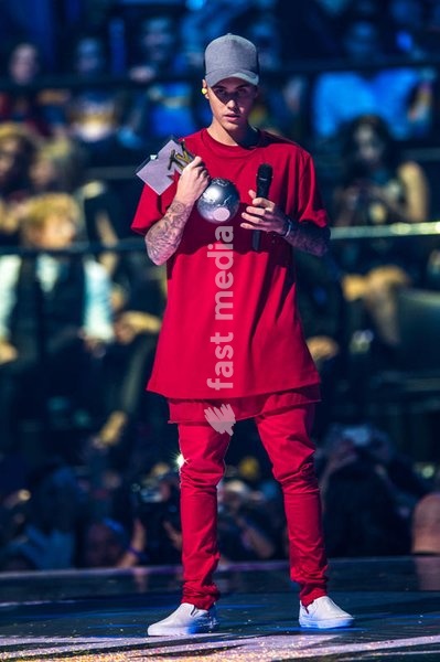 The singer and actor Justin Bieber holding the winner's statue at the MTV Europe Music Awards. Milan, Italy. 25th October 2015