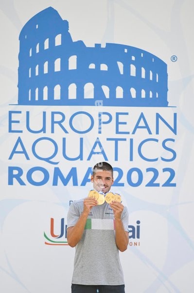 Italian artistic swimmer Giorgio Minisini poses for a picture holding the gold medals won at the XXVI LEN European Championships in Rome, Foro Italico (Italy), August 17th, 2022. Giorgio Minisini won gold medal in Solo Technical, Solo Free, Mixed duet technical and mixed duet free