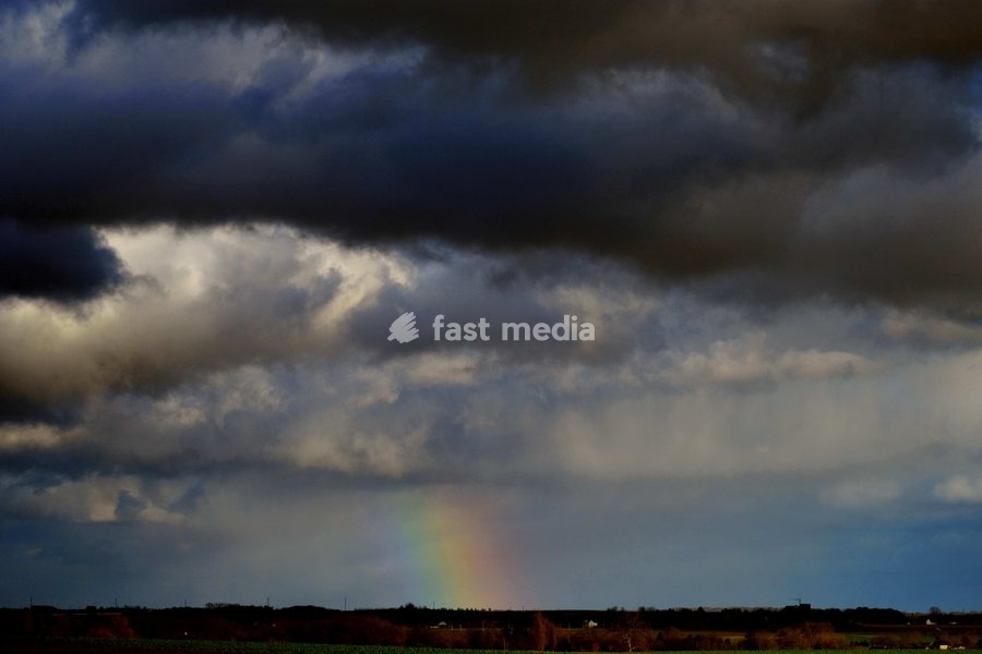 Rainbow pictured in Helecine, Monday 06 January 2025. There is a yellow alert on Belgium today for heavy winds