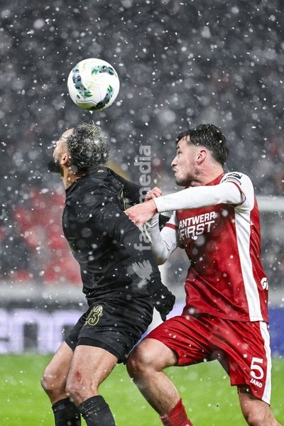 Union's Soufiane Boufal and Antwerp's Olivier Deman pictured in action during a soccer game between Royal Antwerp and Royale Union Saint-Gilloise, Wednesday 08 January 2025 in Antwerp, in the 1/4 finals of the 'Croky Cup' Belgian soccer cup