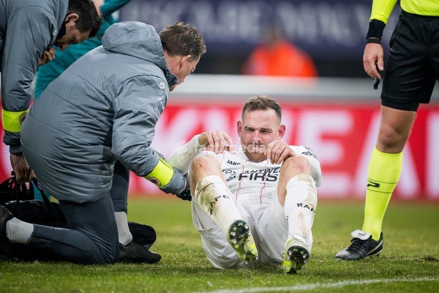 Antwerp's Vincent Janssen lies on the ground during a soccer game between RSC Anderlecht and Royal Antwerp, Thursday 16 January 2025 in Brussels, in the 1/2 finals of the 'Croky Cup' Belgian soccer cup