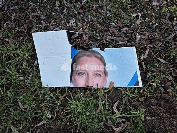A torn-off election poster of chancellor candidate Alice Weidel (AfD - Alternative for Germany) lies on the ground. Early federal elections will be held in Germany on 23 February 2025 after the so-called traffic light coalition collapsed at the end of 2024, Frankfurt am Main, Hesse, Germany, Europe