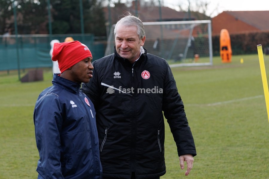 Kortrijk's Karim Dermane and Kortrijk's new head coach Bernd Storck pictured during a training session of Belgian first division soccer team KV Kortrijk to present its new coach, Friday 21 February 2025 in Kortrijk. Storck is new head coach of KV Kortrijk. Czuczi joins the technical staff as…