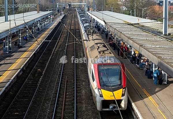 Greater Anglia, British Rail Class Stadler 755 bi-modal multiple unit passenger train arriving at Ipswich railway station, Suffolk, England, UK