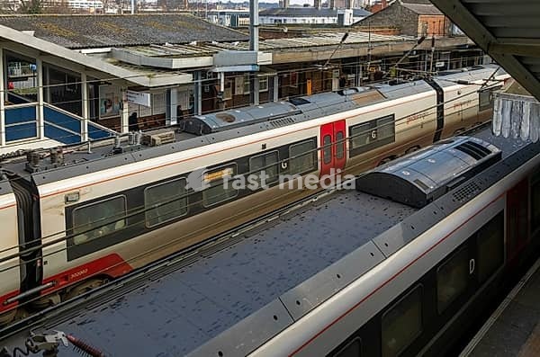 Looking down from above at Greater Anglia trains at platforms of Ipswich railway station, Suffolk, England, UK