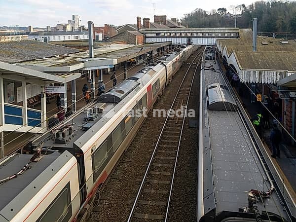 Looking down from above at Greater Anglia trains at platforms of Ipswich railway station, Suffolk, England, UK