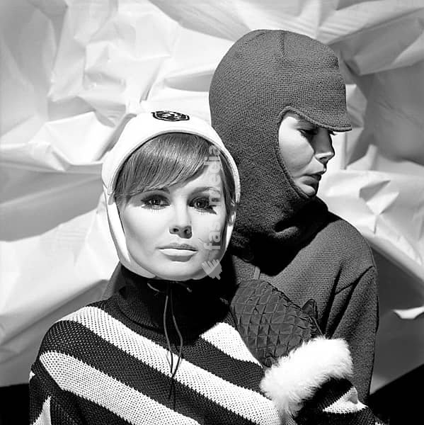 In the 1960s. Fashion models, in typical 1960s winter clothes in a studio. They are wearing warm and covering caps. Sweden 1966