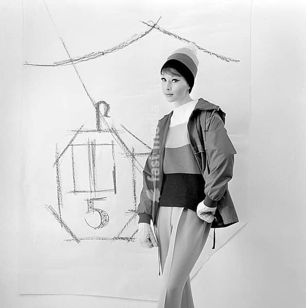 In the 1960s. A fashion model, in typical 1960s winter clothes in a studio. The trousers are made of synthetic material, so is the practical nylon jacket. Sweden 1960s